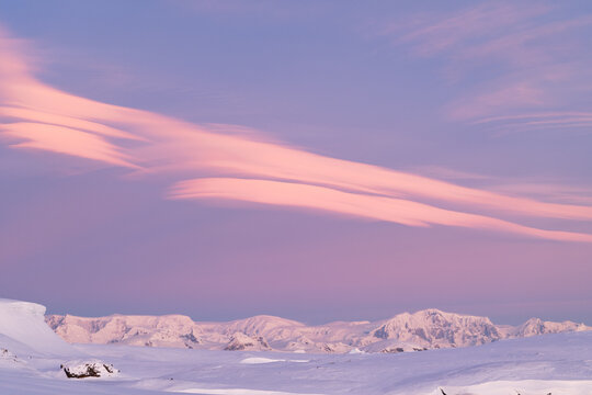 Cloudscape with rare Nacreous clouds at sunset in Antarctica. Sk