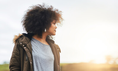 Woman, thinking or nature sunset view for travel, adventure or holiday vacation in Namibia lens flare. African girl, planning or vision ideas at sunrise for relax on break, peace or inspiration