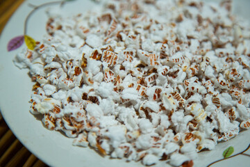 Traditional popped rice or stuffed rice snack from the dayak iban tribe, natural background 