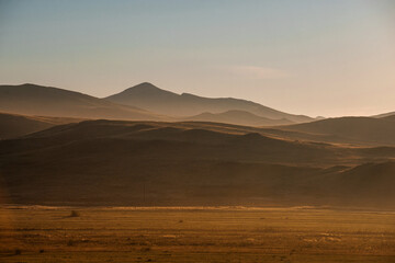 Golden dawn with Tupan in the hills