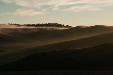 Golden dawn with Tupan in the hills