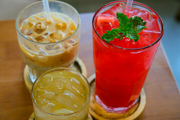 Cold and clean transparent drinks against background of a sunny summer day, thirsty. watermelon juice latte mint