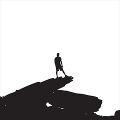 Silhouette of a man standing on a cliff edge against a vast, empty sky.