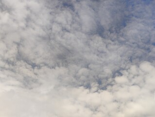 Scattered Thoughts in a Clear Mind: The Sky as a Canvas of Serenity, Where Fleeting Clouds Represent Passing Worries and the Vast Blue Symbolizes Inner Peace and Endless Possibilities.