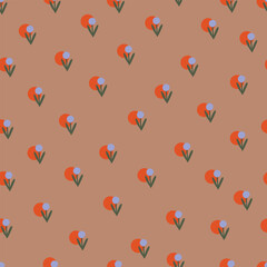 Orange polka dots and flowers on brown background. Seamless pattern