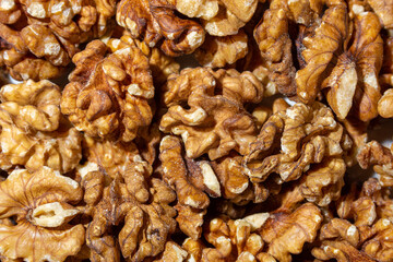 Scattered Shelled Walnuts. Background from Walnut. Natural High-Calorie Snacks