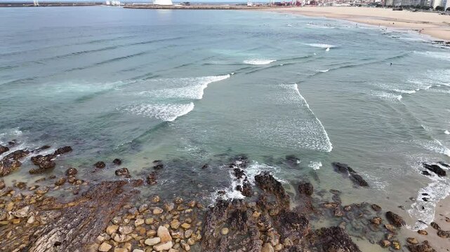Portugal beach - an aerial shot of the sandy Matosinhos beach at the Atlantic Ocean.