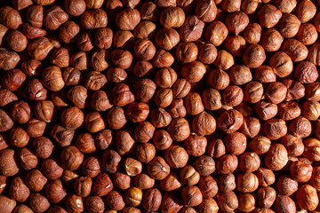 Scattered Peeled Hazelnut - Top View. Background from Hazelnuts. Natural High-Calorie Snacks