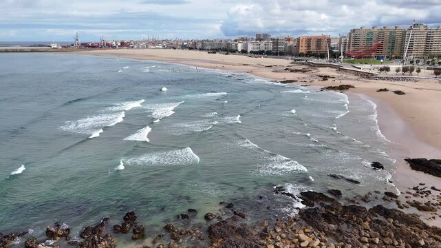 Portugal beach - an aerial shot of the sandy Matosinhos beach at the Atlantic Ocean.