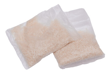 A Plastic Bags of White Long Grain Rice - Isolated on White Background. Small Transparent Packages with Dry Rice - Isolation
