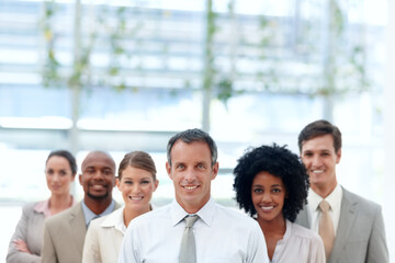 Obraz premium Portrait, leader and happy for collaboration, group and professional for teamwork and confident. Business, friends and employees of insurance company, underwriter and diversity of corporate people