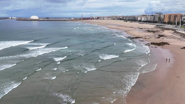 Portugal beach - an aerial shot of the sandy Matosinhos beach at the Atlantic Ocean.