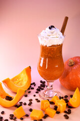 pumpkin latte with whipped cream. hot spicy drink for warm autumn evenings. healthy nutritious drink.
