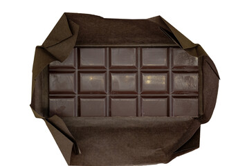 Unwrapped dark chocolate bar. Terroir chocolate bar in a brown paper wrapper, isolated. Top view. 