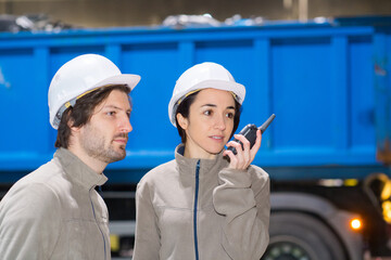 close-up of male and female construction workers