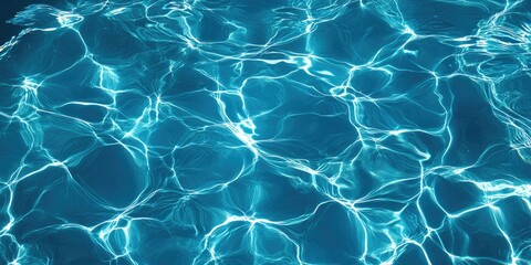 Blue swimming pool water surface with rippling waves in the background. Summer abstract reflections and caustics in the swimming pool.