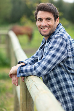 australian stockman with horses smiling