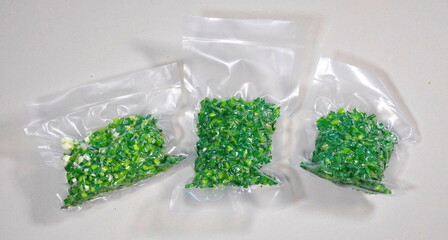 Plastic Granules Packaged Close-Up Bright Green White Background