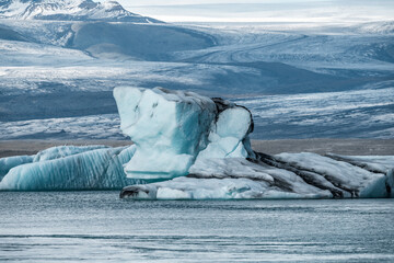 The Glacier Lagoon Jokulsarlon in Iceland, Europe. With big blue icebergs on the water.