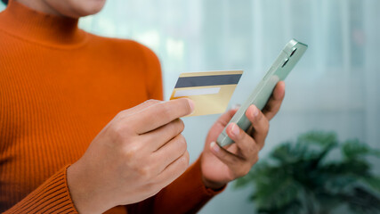 Online banking transaction concept, Woman with credit card using smart phone and shopping online, Ecommerce and secure mobile banking concept, Making online payments.