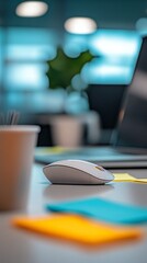 Modern Office Desk with a Computer Mouse and Office Supplies