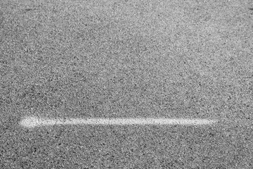 Fototapeta premium asphalt background of a white line