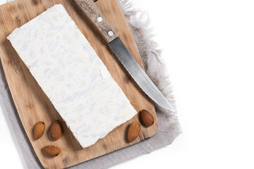 Christmas almond nougat isolated on white background. Top view. Copy space