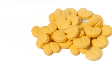 Heart medication pills on a clean white background. Ideal for medical, healthcare, or pharmaceutical concepts, highlighting treatment and cardiovascular health.