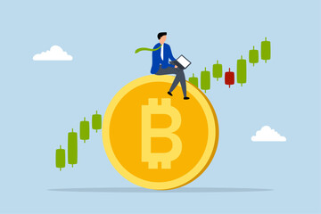 Bitcoin and cryptocurrency investing, business investor is using a computer to engage in cryptocurrency trading on the prominent Bitcoin platform, utilizing a candlestick price graph chart.