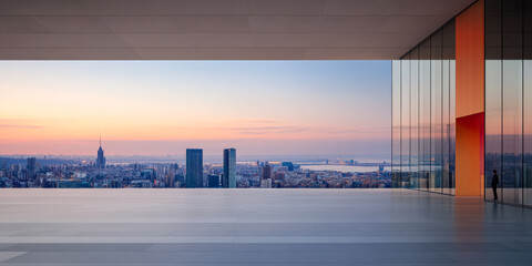Panoramic city view at sunset from a modern high-rise building overlooking New York City