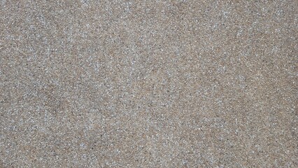 Texture of gravel concrete wall pattern background. A small rock and sand surface background texture. Gravel, small stone. 
