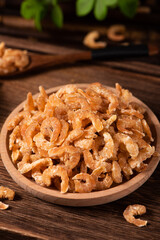dried shrimp on wooden table. seafood ingredients.