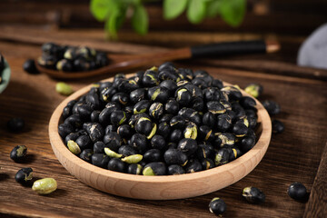 Black Soybean baked roasted fried shell cracked on table.