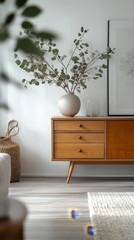 A stylish, minimalist living room area featuring a mid-century modern commode with a cozy decorations, leafs in vase. The room includes elegant decor, Generative AI
