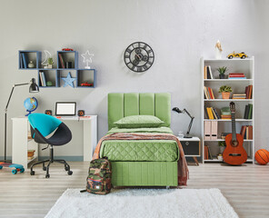 Teenage bedroom interior concept with bookshelf, lamp, table, book and notebook, frame, guitar,...