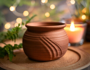 Close-Up of a Clay Candleholder with Rustic Finish and Handcrafted Design