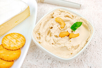 Homemade vegan cashew cheese. Raw healthy sauce in a bowl, lactose free food. Bio organic product