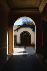 Picturesque historical buildings in central Ljubljana, capital of Slovenia. Autumnal foliage on the trees.
