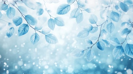 Serene winter nature background with snow-covered thin branches and frosty blue leaves in a soft pale blue blurred landscape, capturing the tranquil beauty of a cold winter day