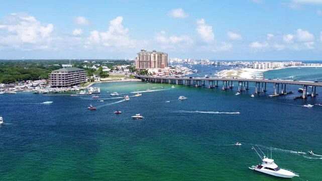 Aerial view of Crab Island, Destin Florida. Crab Island, Destin. Crab Island in Destin, Florida, is famous for its shallow waters, vibrant sandbars, lively atmosphere, perfect for boating relaxation.
