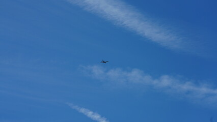 The blue sky view with the flying trail by the aircraft 