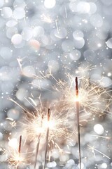 Enjoy a Festive Sparkler Celebration with Glowing Fireworks and Bokeh Lights illuminating the night. Celebrate joy, excitement, and magic with vibrant lights and glittery sparklers