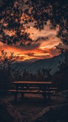Fototapeta premium Serene Rustic Outdoor View with Fiery Sunset