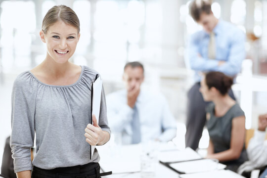 Portrait, smile and woman with documents, boardroom and professional in agency, confident and business. Happy, proud and corporate people in office, underwriter and paperwork for insurance company