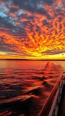 Vibrant Sunset Over the Water from a Ship