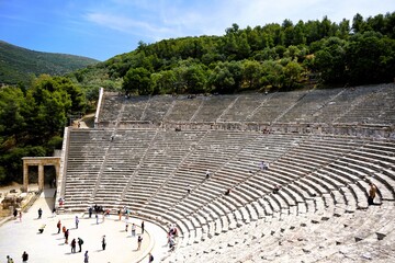 Panoramic view on a sunny summer day over the Ancient Theatre of Epidaurus in Greece, dedicated to...