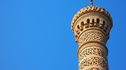 Wooden minaret with copy space and blue sky background.