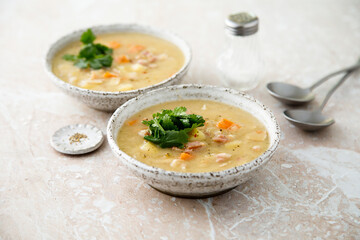 Homemade pea soup with smoked meat
