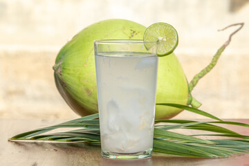 Coconut Beverage and Fruit on Wooden Table – Tropical Style