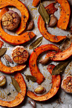 Top view of homemade baked pumpkin with herbs and spices